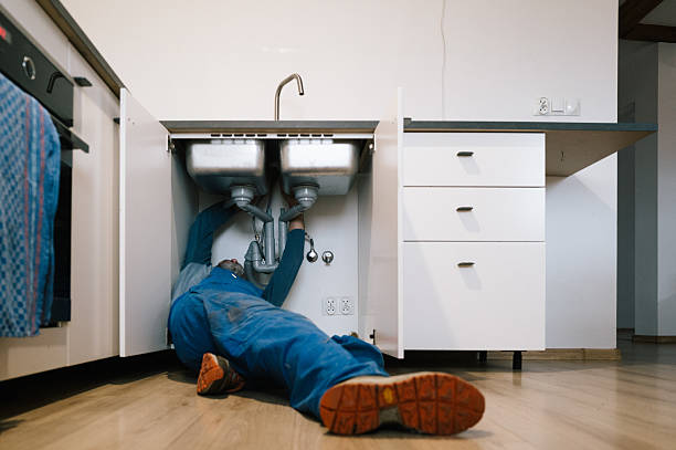Professional Emergency Plumber technician working in Farrell, MS